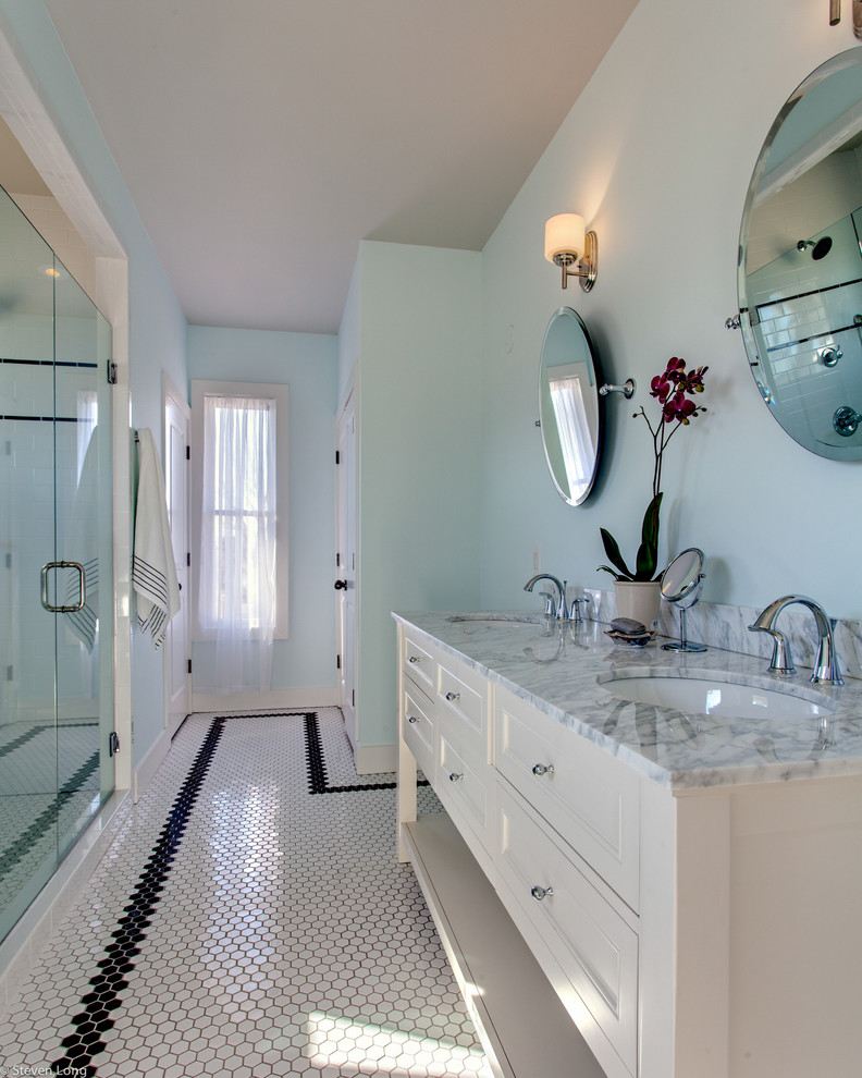 Inspiration for a large country master bathroom in Nashville with shaker cabinets, white cabinets, a freestanding tub, black and white tile, ceramic tile, blue walls, ceramic floors, an undermount sink and marble benchtops.