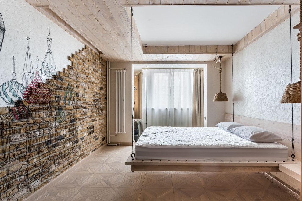 Inspiration for a mid-sized beach style master bedroom in Moscow with beige walls, beige floor, wood and brick walls.