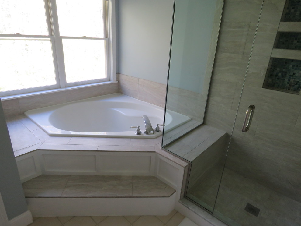Example of a transitional home design design in Boston