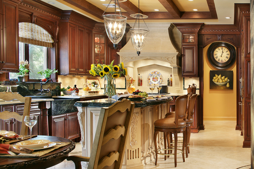 Example of a huge tuscan l-shaped travertine floor eat-in kitchen design in New York with raised-panel cabinets, dark wood cabinets, quartzite countertops, white backsplash, stone tile backsplash, paneled appliances and an island