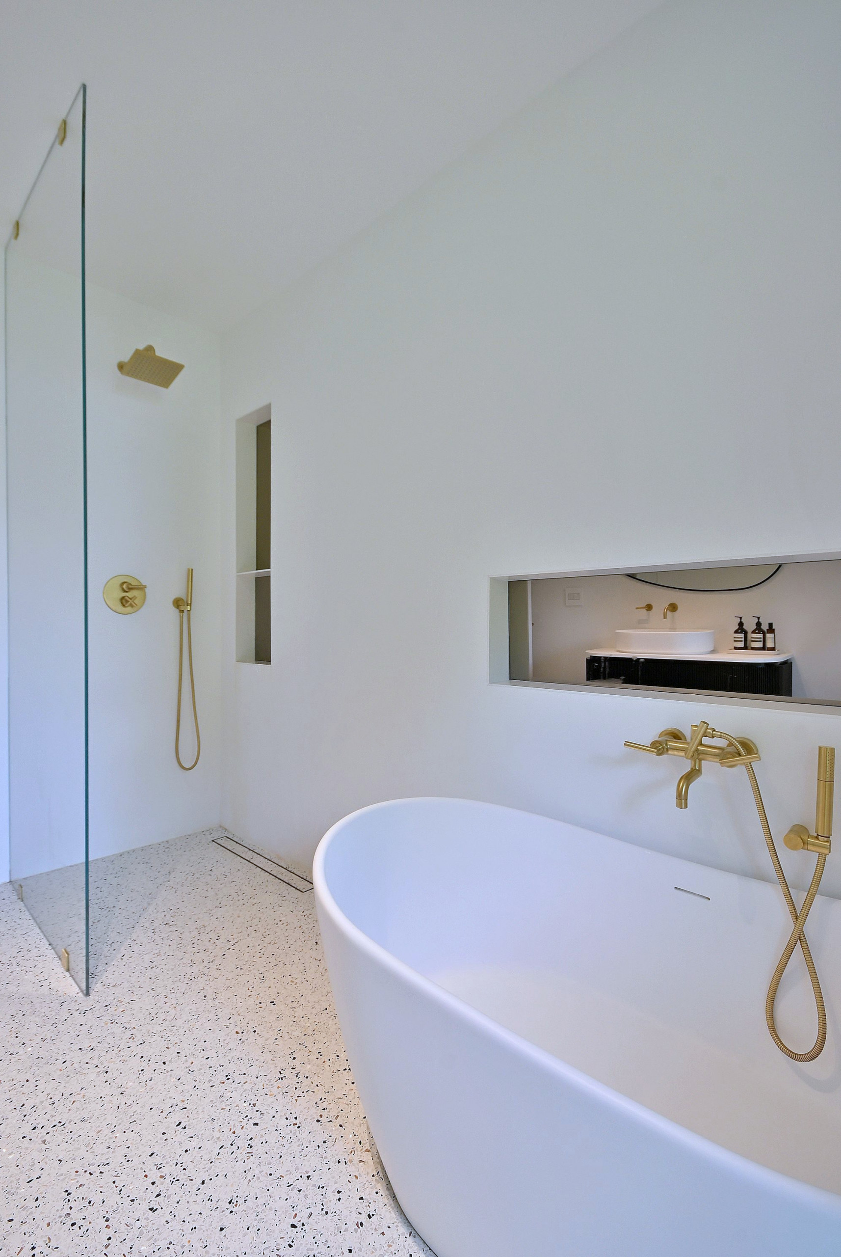 Mid-Century Modern Bathroom with Freestanding Tub