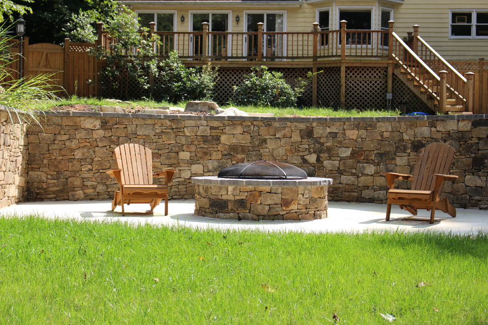 Home design - large rustic backyard custom-shaped natural home design idea in DC Metro with decking