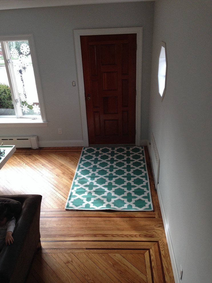Help me find a rug for my awkward entrance