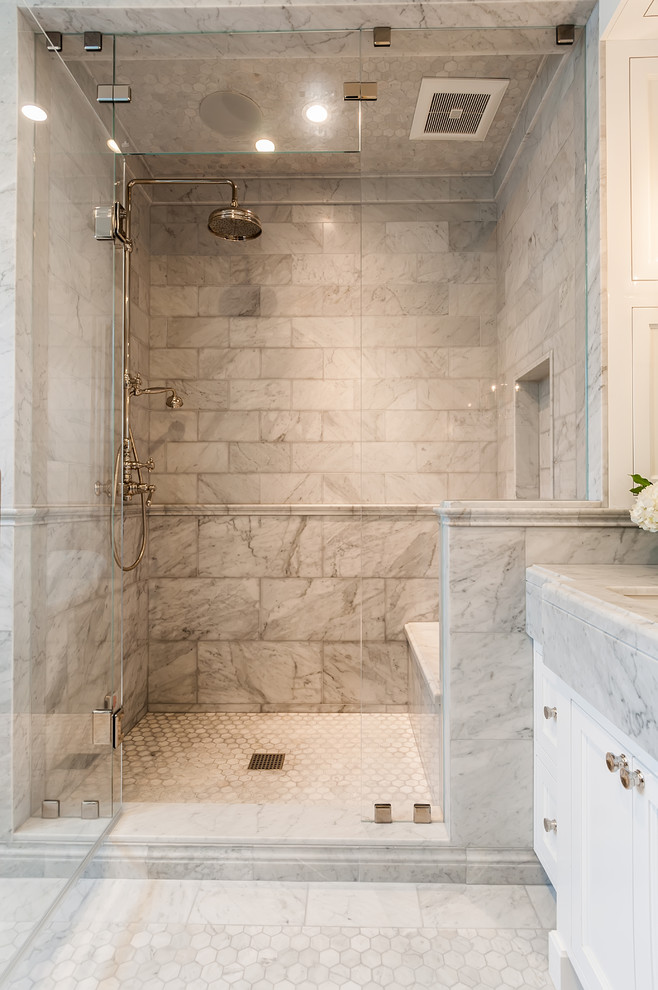 Inspiration for a large country master bathroom in Los Angeles with recessed-panel cabinets, white cabinets, an alcove shower, gray tile, marble, white walls, marble floors, an undermount sink, marble benchtops, white floor, a hinged shower door and white benchtops.