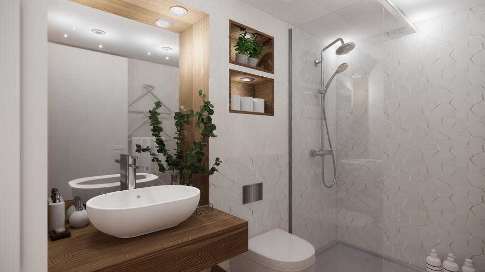 Photo of a small eclectic bathroom in Dijon with a curbless shower, a wall-mount toilet, gray tile, ceramic tile, grey walls, light hardwood floors, a drop-in sink, beige floor, a niche and a single vanity.