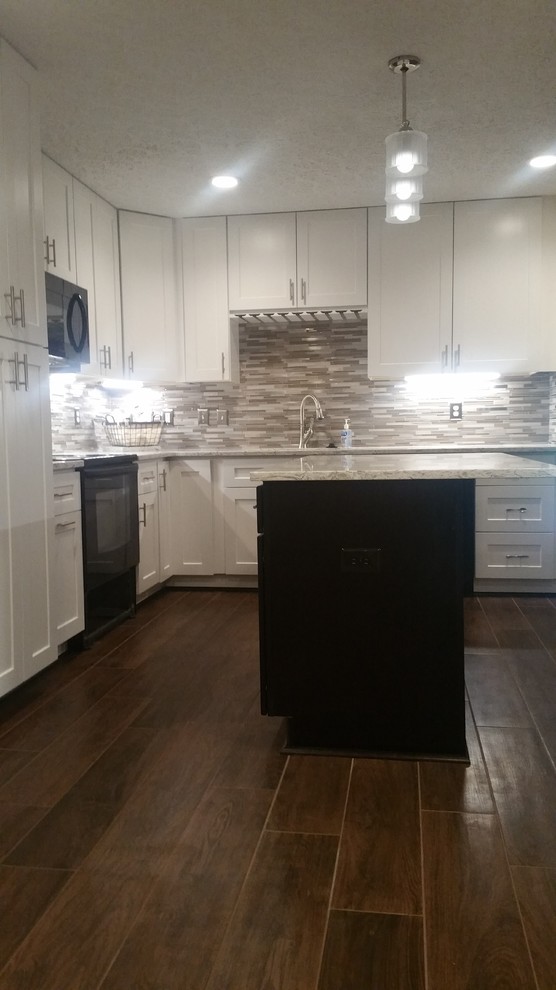 Example of a transitional kitchen design in Raleigh