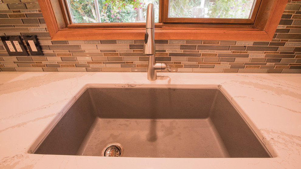 Inspiration for a huge u-shaped porcelain tile and multicolored floor eat-in kitchen remodel in Seattle with an undermount sink, shaker cabinets, medium tone wood cabinets, quartz countertops, multicolored backsplash, mosaic tile backsplash, stainless steel appliances and a peninsula