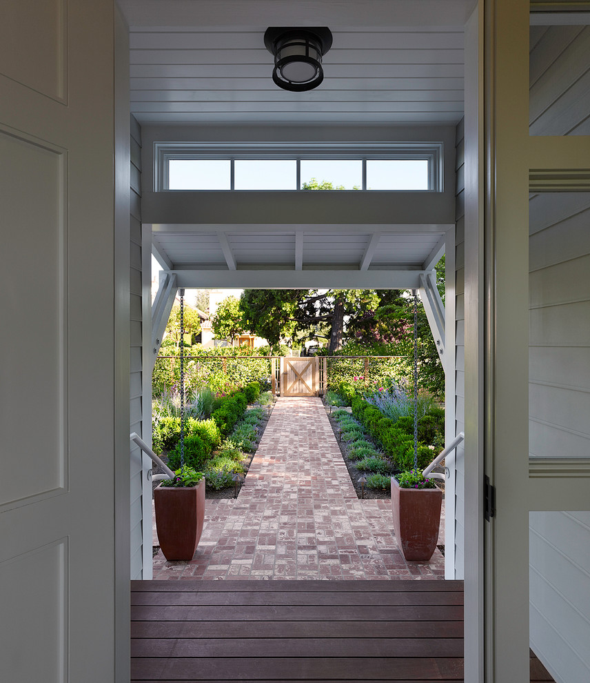 Traditional entryway in San Francisco with a single front door and a white front door.