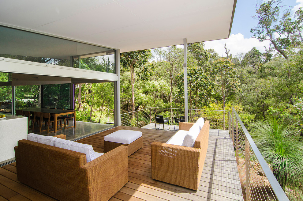 Contemporary balcony in Perth with a roof extension.