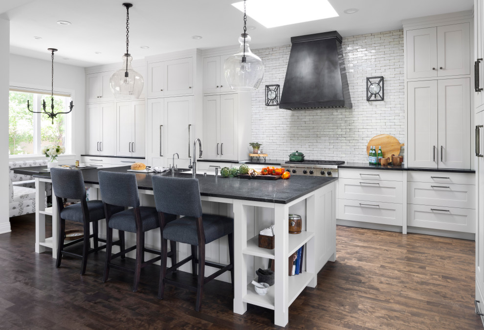Example of a transitional kitchen design in Denver
