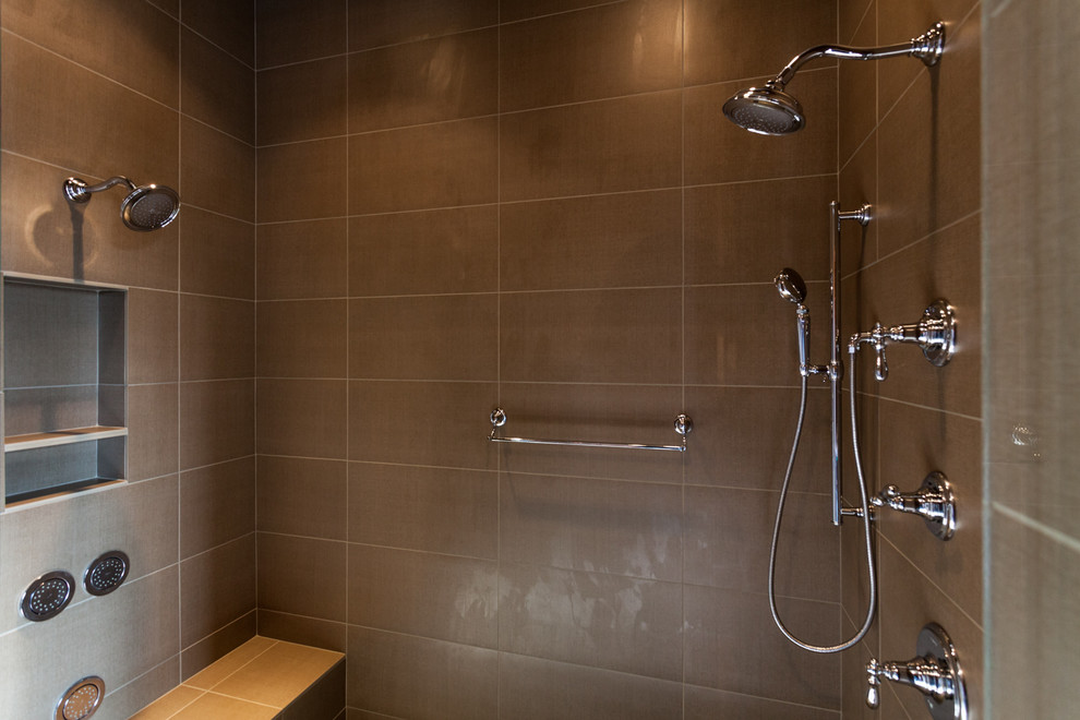 Large mountain style master multicolored tile and ceramic tile ceramic tile freestanding bathtub photo with an undermount sink, flat-panel cabinets, medium tone wood cabinets, quartzite countertops, a two-piece toilet and beige walls