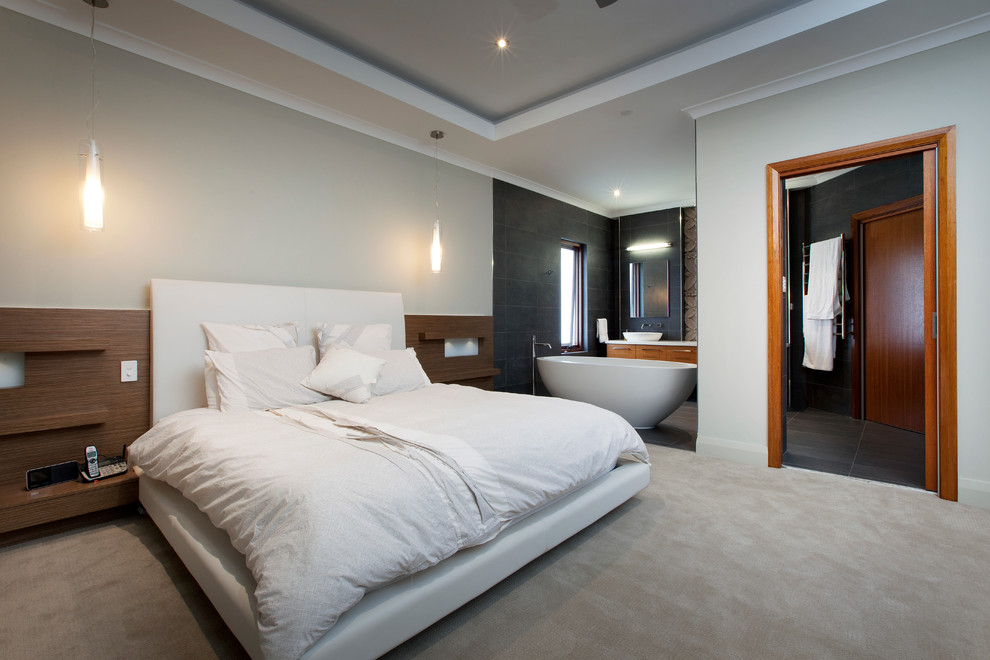 Mid-sized contemporary master bedroom in Perth with grey walls, carpet, no fireplace and beige floor.