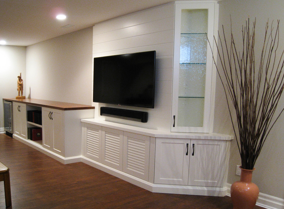 Inspiration for a transitional vinyl floor and brown floor basement remodel in Toronto with gray walls