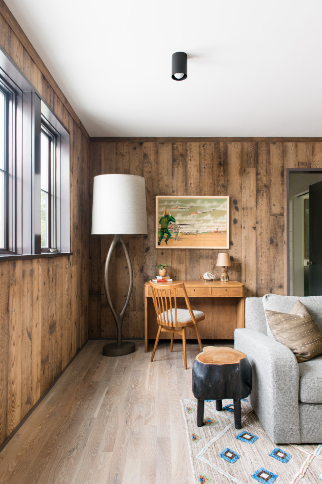 Sullivan's Island Remodel - Upstairs den featuring modern furniture and mushroom board walls and ceiling.