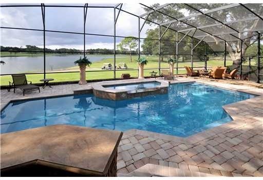 Transitional pool photo in Orlando
