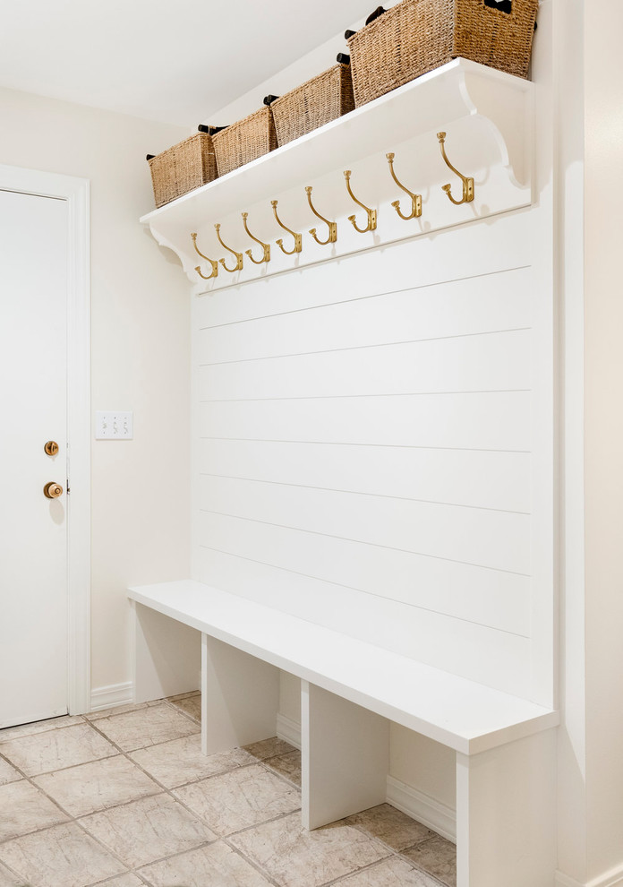 Design ideas for a mid-sized transitional mudroom in Salt Lake City with white walls, porcelain floors, a single front door, a white front door and grey floor.