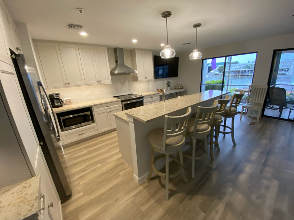 Example of a transitional kitchen design in Miami