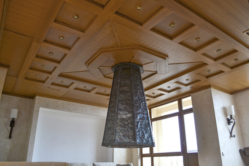 Двухуровневая квартира с кессонными потолками и винтовой лестницей