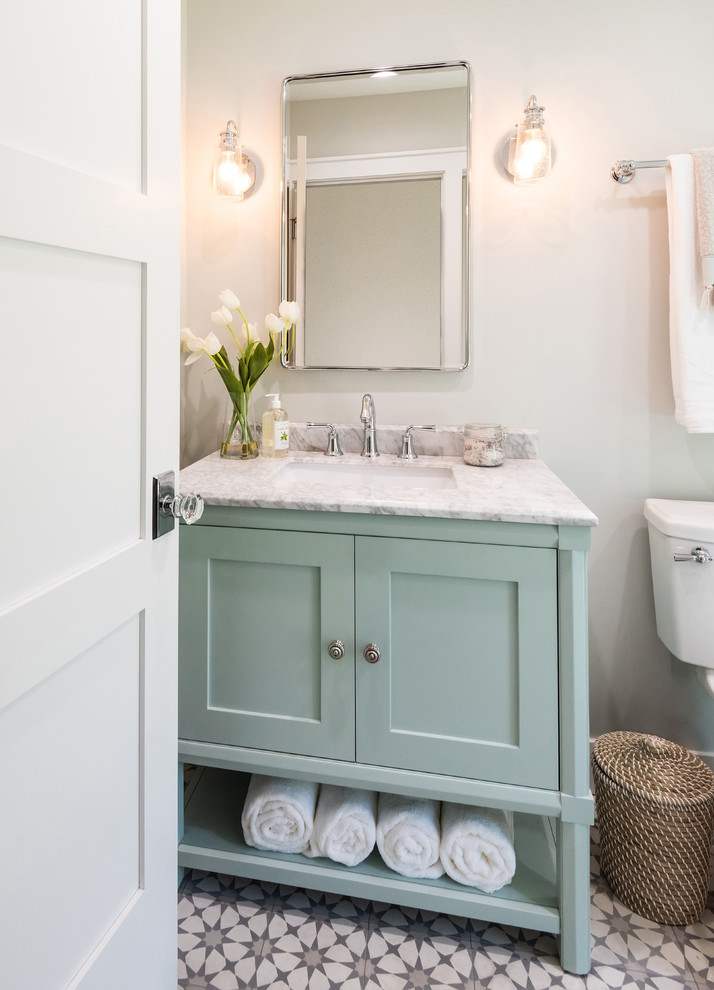 Mid-sized traditional bathroom in San Diego with shaker cabinets, green cabinets, white tile, ceramic tile, grey walls, cement tiles, an undermount sink, engineered quartz benchtops, a hinged shower door and white benchtops.
