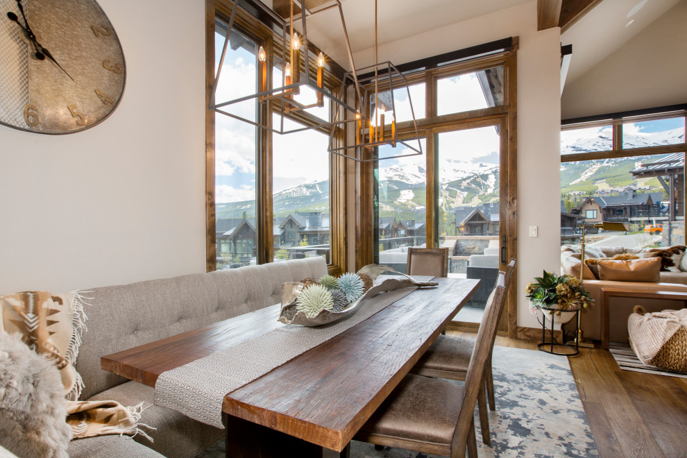 Dining room - rustic dining room idea in Denver