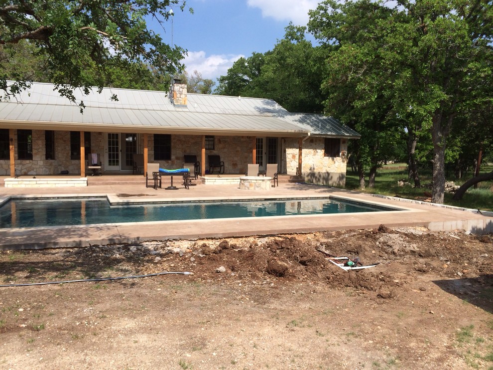 How to handle elevation change off back side of pool deck?