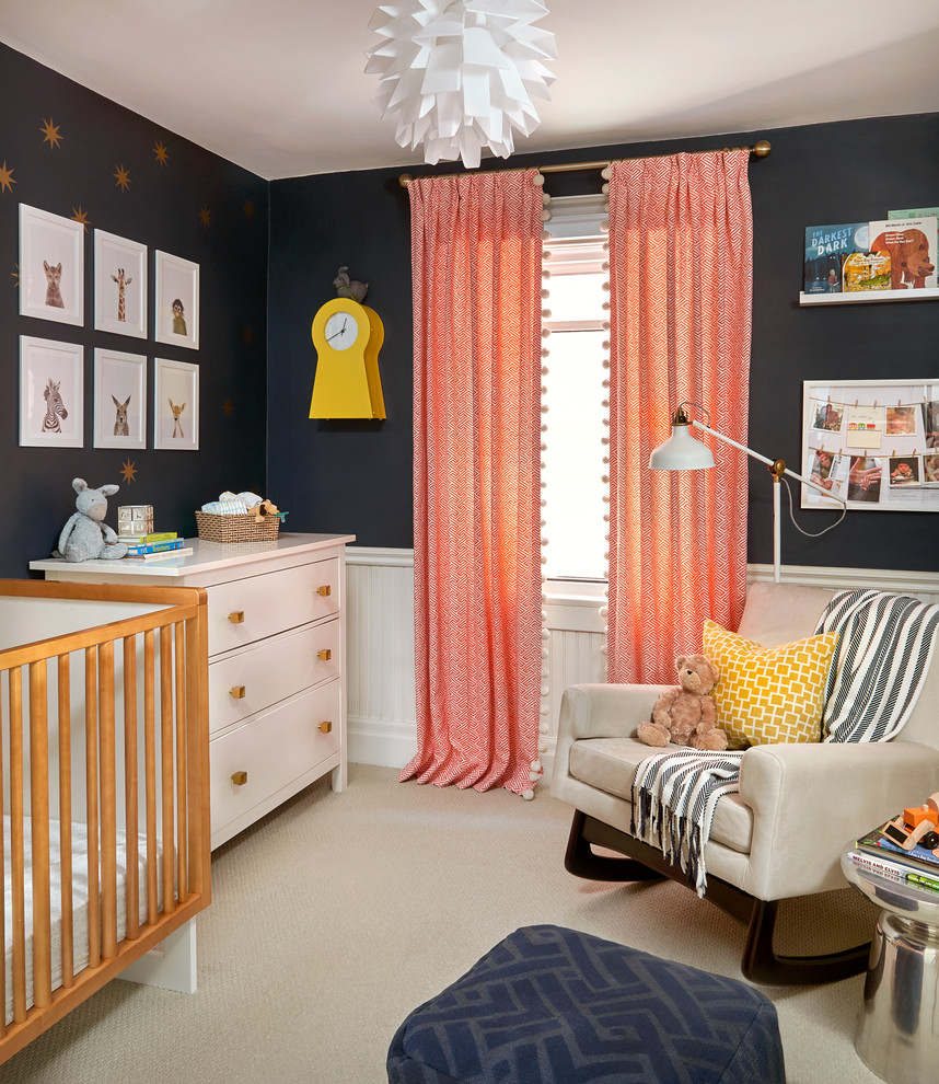 Photo of a transitional gender-neutral nursery in Toronto with carpet, beige floor and black walls.