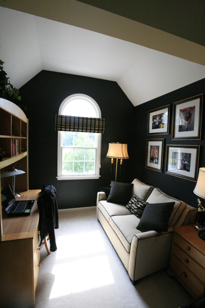 Large traditional bedroom in Baltimore with black walls, carpet and no fireplace.
