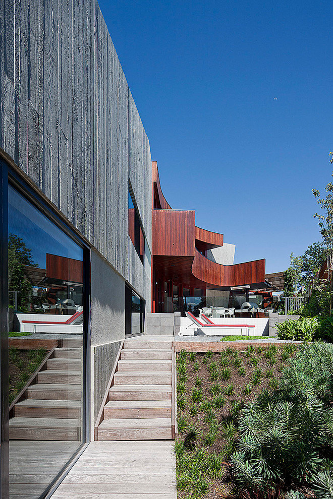 Photo of an expansive contemporary three-storey exterior in Melbourne.