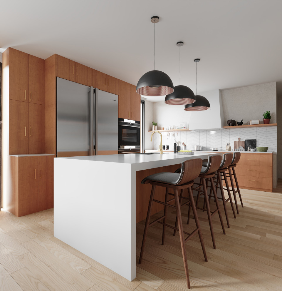 This is an example of a contemporary l-shaped kitchen in Providence with an undermount sink, flat-panel cabinets, medium wood cabinets, stainless steel appliances, light hardwood floors, with island, beige floor and white benchtop.