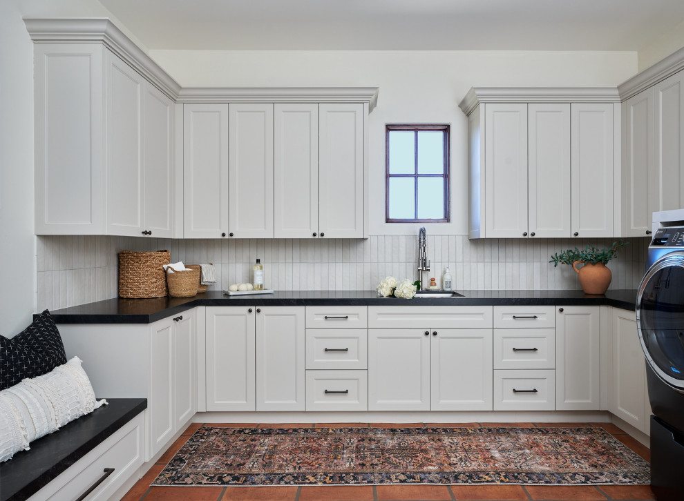 Inspiration for a transitional laundry room remodel in Phoenix