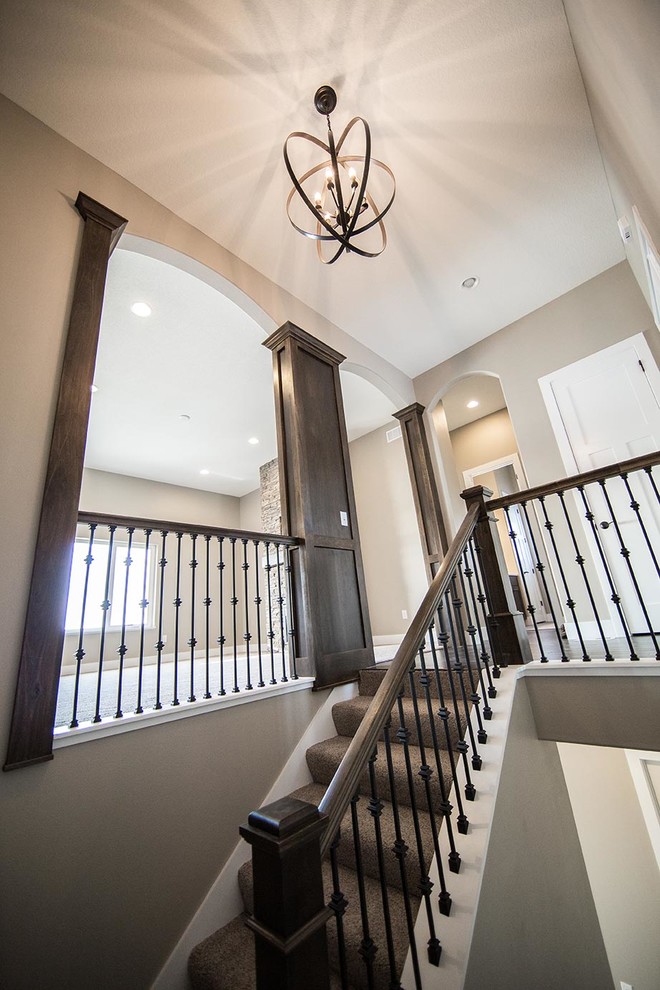 Inspiration for a transitional staircase remodel in Cedar Rapids