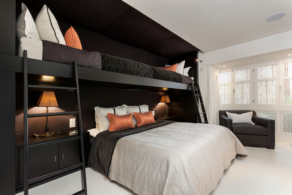This is an example of a contemporary guest bedroom in Other with white walls.