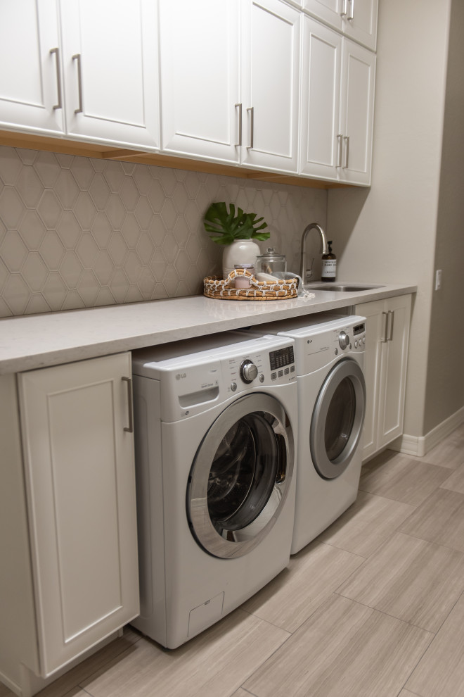 Transitional laundry room photo in Phoenix