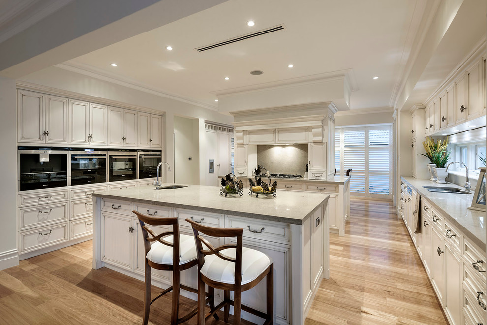 Traditional kitchen in Perth with an undermount sink, recessed-panel cabinets and white cabinets.