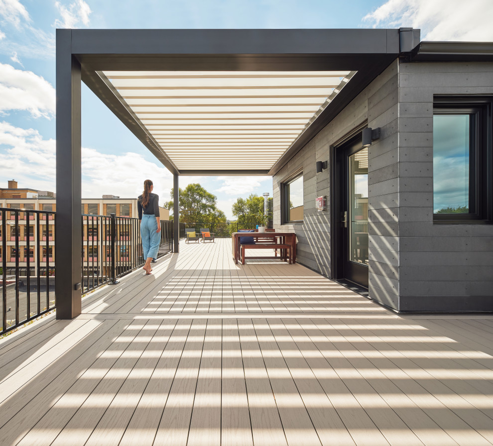 Photo of an industrial roof terrace in Toronto with feature lighting.