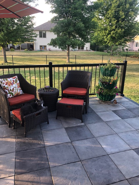 Small backyard ground level deck photo with no cover