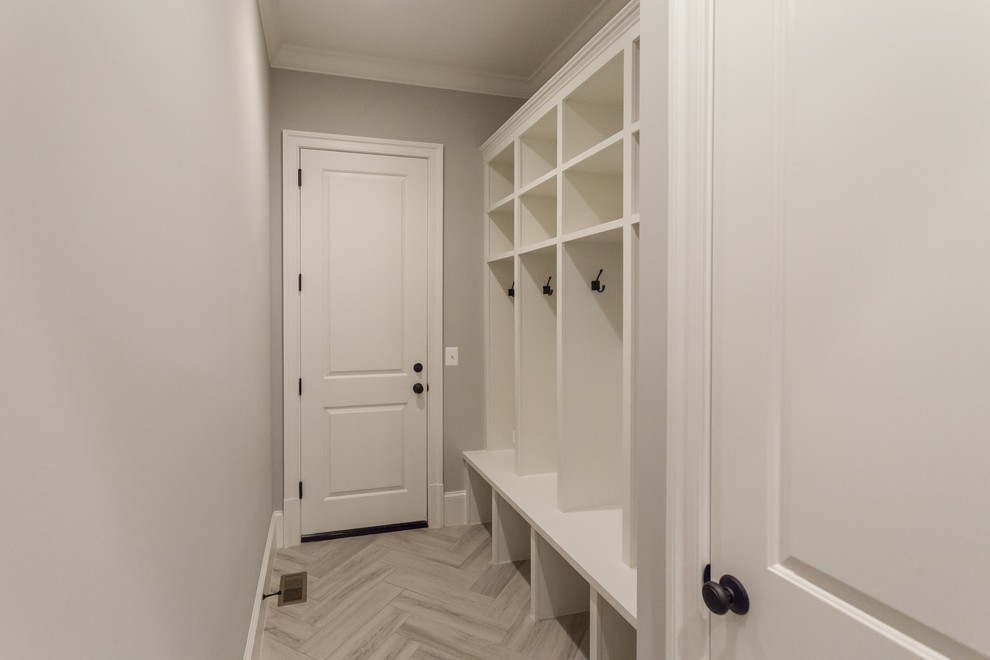 Inspiration for a transitional gray floor home design remodel in DC Metro with gray walls
