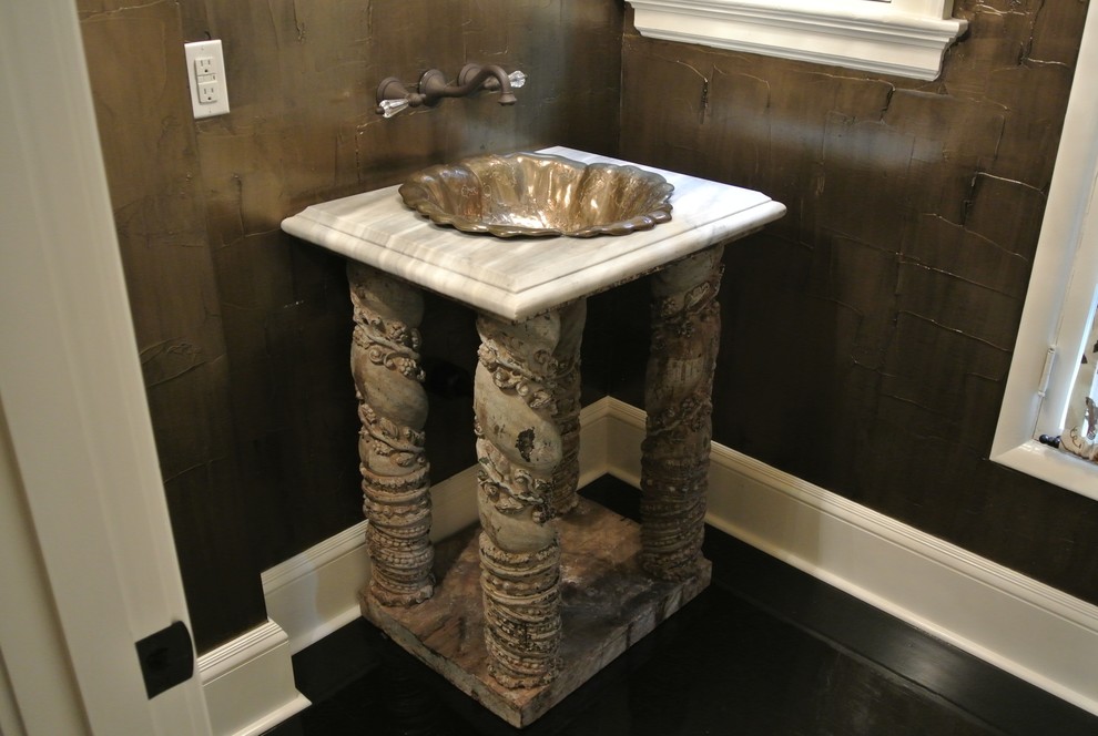 This is an example of a traditional powder room in Denver.
