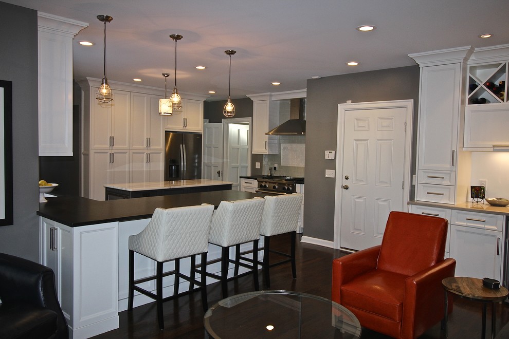 Mid-sized eat-in kitchen photo in Omaha with stainless steel appliances