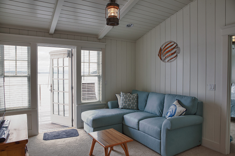Design ideas for a beach style family room in Seattle.