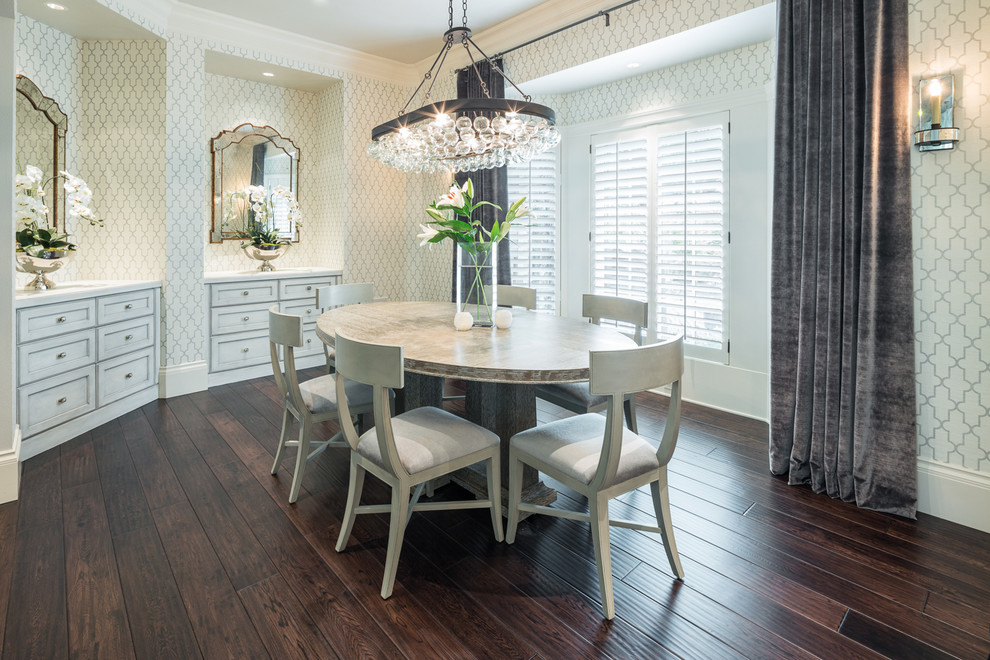 Design ideas for a transitional dining room in Portland with white walls and dark hardwood floors.