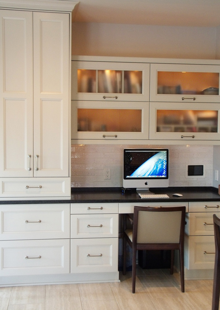 Mid-sized transitional built-in desk beige floor and porcelain tile home office photo with white walls and no fireplace