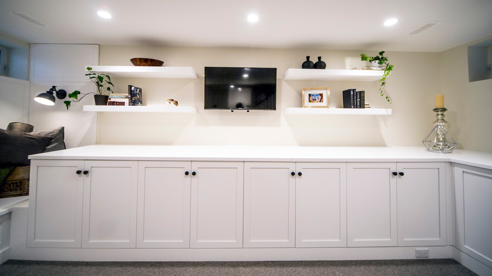 Inspiration for a small transitional look-out carpeted and gray floor basement remodel in Ottawa with beige walls