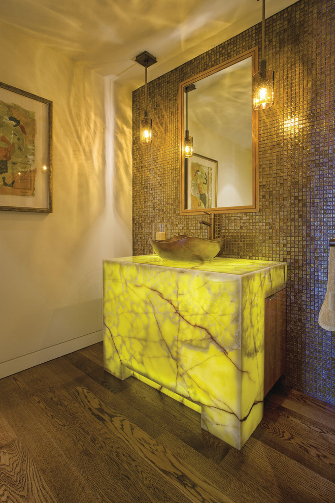 Photo of a mid-sized contemporary powder room in San Francisco with brown tile, mosaic tile, beige walls, dark hardwood floors, a vessel sink and yellow benchtops.