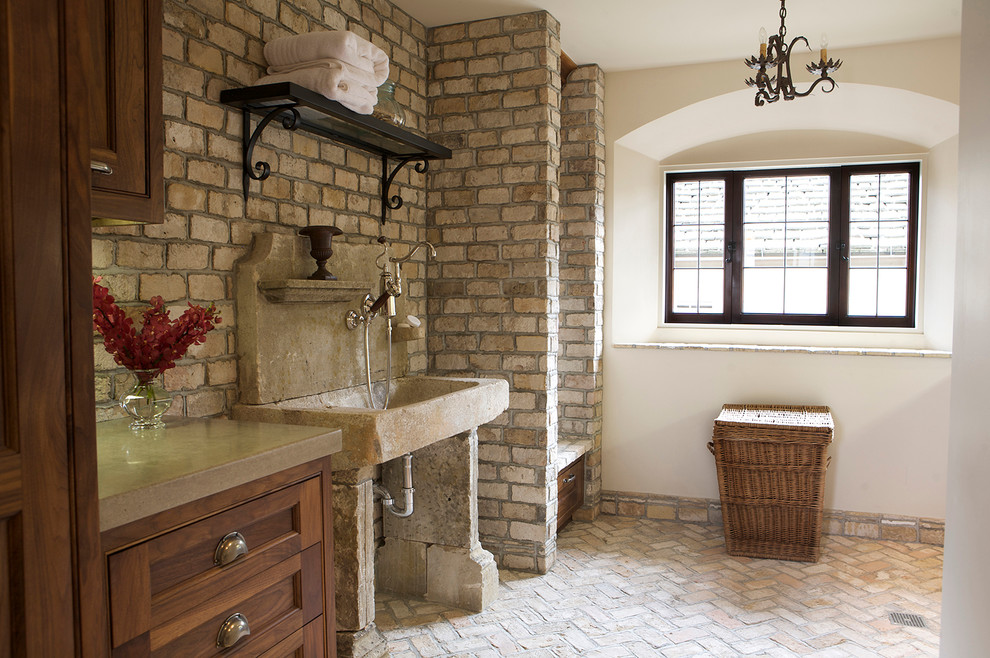 Photo of a mediterranean laundry room in Orange County.