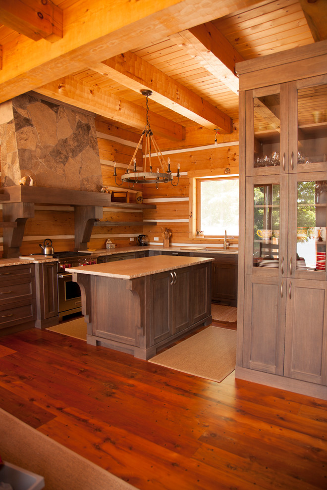 Inspiration for a mid-sized country u-shaped kitchen in Toronto with an undermount sink, recessed-panel cabinets, medium wood cabinets, granite benchtops, stainless steel appliances, medium hardwood floors and with island.