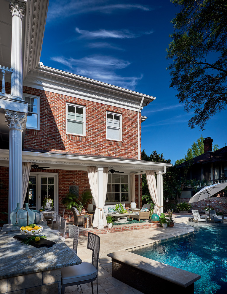 Transitional red brick exterior home photo