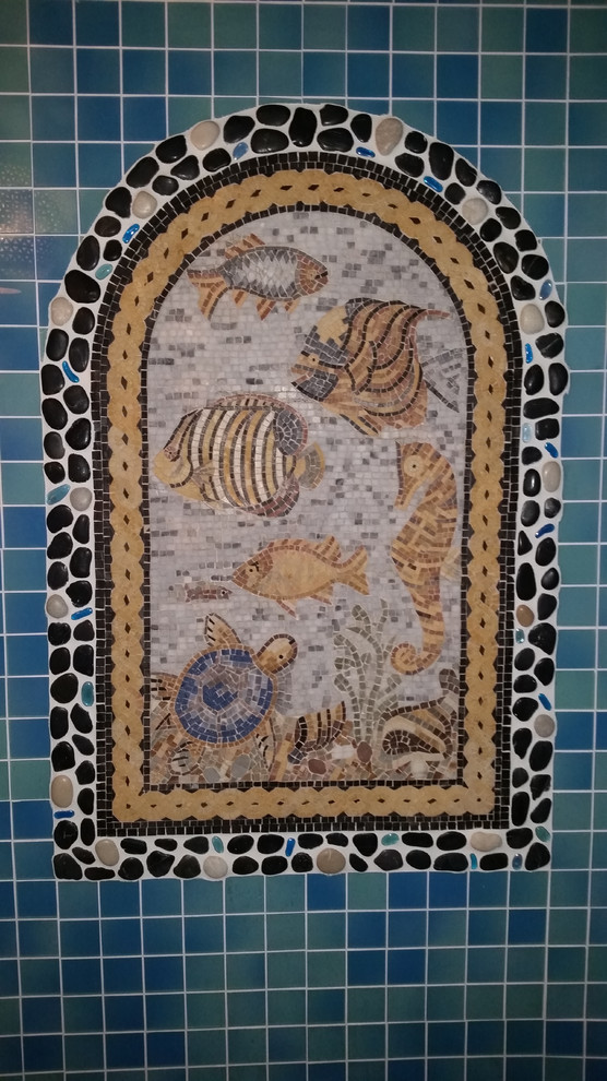Photo of a beach style bathroom in Chicago with multi-coloured tile and mosaic tile.