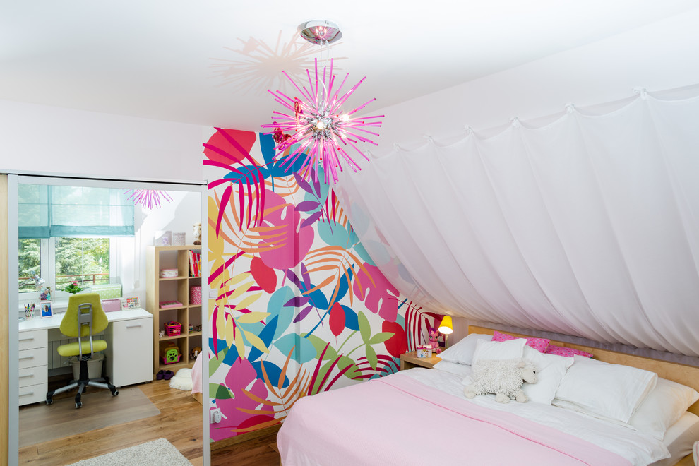 Design ideas for an eclectic kids' bedroom for kids 4-10 years old and girls in Other with white walls and medium hardwood floors.