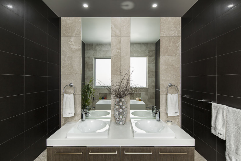 Inspiration for a large contemporary 3/4 bathroom in Adelaide with furniture-like cabinets, dark wood cabinets, a freestanding tub, stone tile, brown walls, travertine floors, a one-piece toilet, black tile, quartzite benchtops, brown floor and green benchtops.